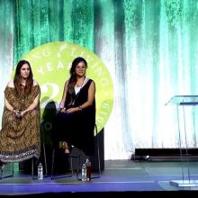 Four women seated on a stage at Young Living International Grand Convention 2019