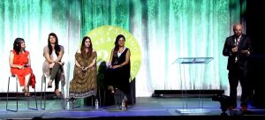 Four women seated on a stage at Young Living International Grand Convention 2019