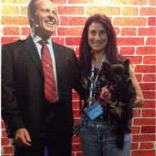Young Living member Sharon Evans with a picture of founder D. Gary Young